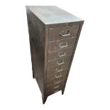 A VINTAGE POLISHED STEEL PEDESTAL CHEST OF NINE DRAWERS. (29cm x 44cm x 99cm) Condition: good