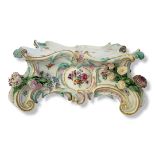 MEISSEN, A MID 19TH CENTURY HARD PASTE PORCELAIN ROCOCO DESIGN TABLE STAND/CENTREPIECE Polychrome