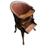 A RARE 18TH/19TH CENTURY IRISH RED WALNUT CHILD'S OPEN ARM/HIGH CHAIR With wrexin leather upholstery
