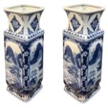 A LARGE PAIR OF JAPANESE BLUE AND WHITE RECTANGULAR VASES Decorated with a mountainous landscape