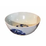 A LARGE CHINESE BLUE AND WHITE BOWL Exterior showing a lady performing different activities with