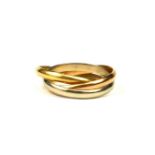 AN 18CT TRICOLOURED GOLD TRINITY RING. (UK ring size M½, 6g)