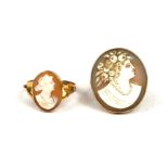A LARGE VICTORIAN YELLOW METAL CARVED SHELL CAMEO RING TESTS FOR 9CT GOLD TOGETHER WITH ANOTHER
