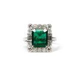 AN 18CT WHITE GOLD, RECTANGULAR EMERALD & DIAMOND RING with WGI certificate. (Emerald 3.58ct.