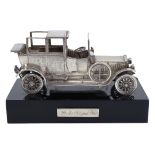 A SOLID SILVER ROLLS-ROYCE 1911 SILVER GHOST SCULPTURE Mounted on black base, hallmarked Spanish