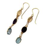 A PAIR OF YELLOW METAL, AMETHYST, CITRINE AND BLUE TOPAZ DROP EARRINGS Oval cut stones in with