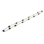 A 9CT GOLD, PEARL AND LAPIS LAZULI NECKLACE HAVING STYLISED FIGARO LINKS. (length 71cm, gross weight