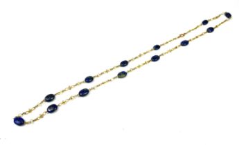 A 9CT GOLD, PEARL AND LAPIS LAZULI NECKLACE HAVING STYLISED FIGARO LINKS. (length 71cm, gross weight
