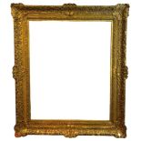 A LARGE LATE 18TH/EARLY 19TH CENTURY ENGLISH GILTWOOD AND GESSO FRAME Decorated with shells