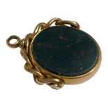 A LARGE VICTORIAN 9CT GOLD, BLOODSTONE AND CARNELIAN SWIVEL FOB, HALLMARKED, 1884 Having stylised