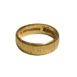 CHARLES GREEN & SON LTD, A 22CT GOLD TEXTURED BAND Hallmarked Birmingham, 1968. (UK ring size P½,