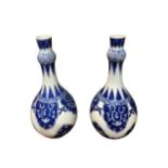 A PAIR OF CHINESE BLUE AND WHITE SUANTOUPING GARLIC MOUTH SHAPED VASES Decorated with geometric