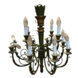 A 20TH CENTURY FRENCH DESIGN CARVED GILTWOOD AND GILT METAL MOUNTED TWELVE BRANCH CHANDELIER. (