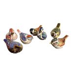 ROYAL CROWN DERBY, A SELECTION OF SEVEN BIRD/DUCKLING FIGURES To include a gold buttoned crested