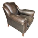 A 20TH CENTURY FRENCH ART DECO DESIGN BROWN LEATHER ARMCHAIR Raised on square tapering legs. (h 86cm