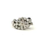 A WHITE METAL & DIAMOND CLUSTER RING Diamonds approx. 1.10ct
