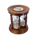 AFTER 16TH CENTURY MARY, QUEEN OF SCOTS TIMER, A 20TH CENTURY MAHOGANY SAND TIMER Having gilt ‘M’