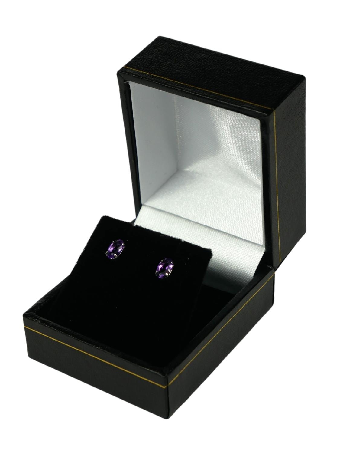 A PAIR 18CT WHITE GOLD AMETHYST STUDS. (Approx Amethyst 0.80ct) - Image 2 of 2