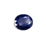 A LARGE LOOSE OVAL SAPPHIRE (glass filled/treated) 7.70ct.