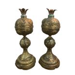 A PAIR OF 19TH CENTURY INDO-PERSIAN OIL LAMPS Having pierced decoration with further decorated