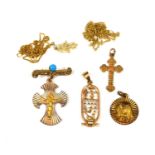 A 14CT GOLD PENDANT DEPICTING MADONNA, TOGETHER WITH A COLLECTION OF 9CT GOLD PENDANTS AND