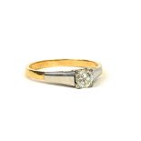 AN 18CT YELLOW AND WHITE GOLD DIAMOND SOLITAIRE RING. (0.36ct, UK size O, 2.5g)