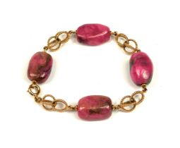 A 14CT GOLD AND RHODONITE BRACELET. (length 22.5cm, gross weight 46.8g)