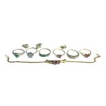 A COLLECTION OF 18CT AND 14CT GOLD JEWELLERY Comprising two 18ct white gold and emerald rings,