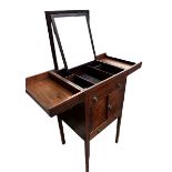 A GEORGE III MAHOGANY AND LINE INLAID GENTLEMEN’S DRESSING TABLE The double hinge top opening to