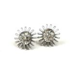 A PAIR OF MID CENTURY WHITE METAL AND DIAMOND EARRINGS. (tested for 14ct, diameter 15mm, 4.6g)