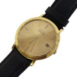 PIAGET, AN 18CT GOLD AUTOMATIC GENTâ€™S WRISTWATCH Having a circular gold tone dial and calendar