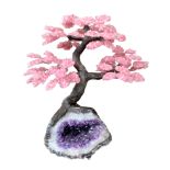 A LARGE ROSE QUARTZ GEMSTONE TREE ON AMETHYST GEODE (h 47cm x w 45cm x d 35cm)