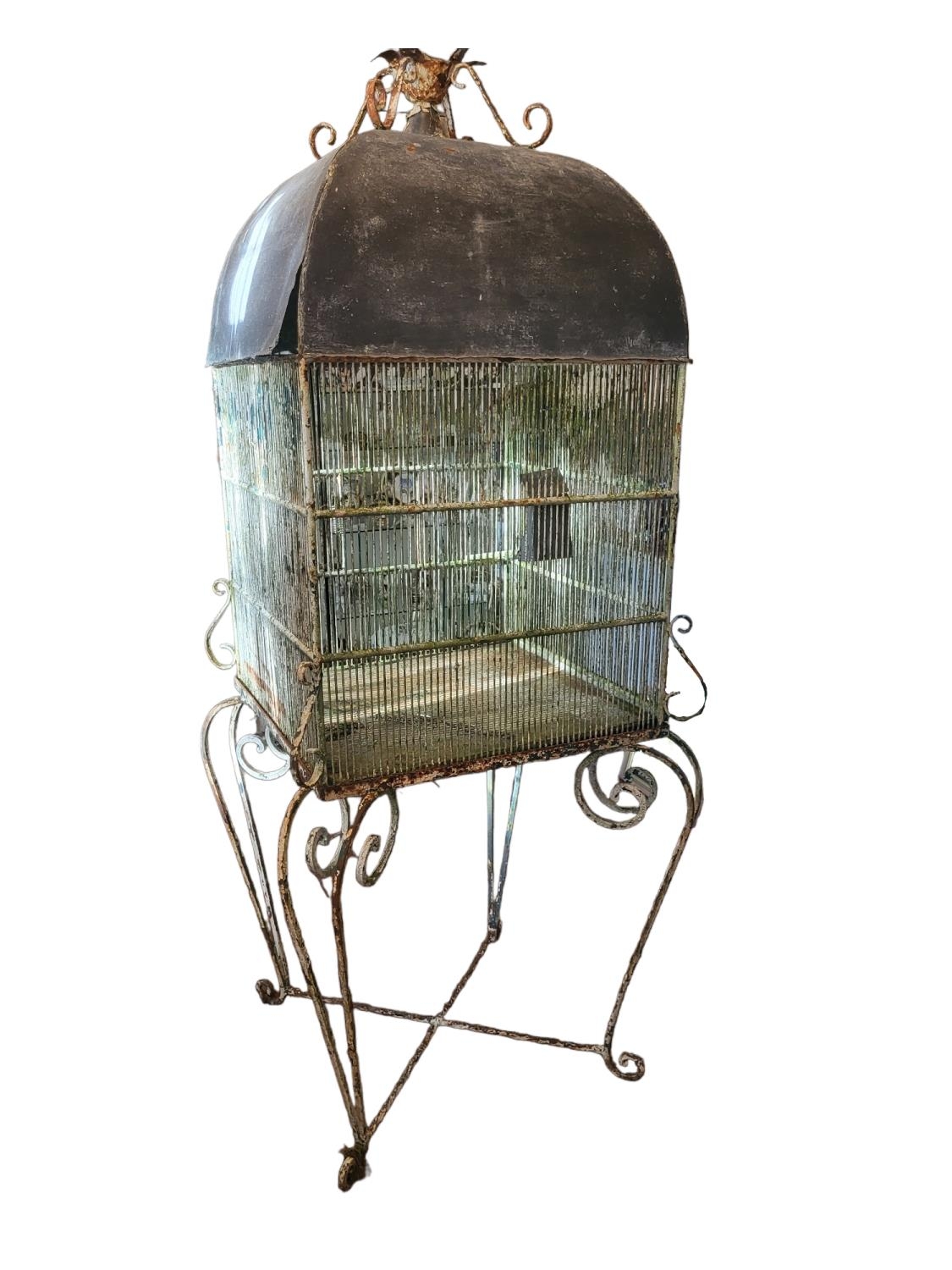 A LARGE 19TH CENTURY PAINTED IRON AND ZINC DOMED TOPPED BIRDCAGE ON WROUGHT IRON SCROLL WORK - Image 2 of 2