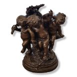 A LARGE ROCOCO STYLE BRONZE GROUP, PUTTI CELEBRATING HARVEST FESTIVAL Surrounded by grapes and