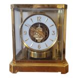 JAEGER LECOULTRE, A GILT BRASS AND GLASS ATMOS CLOCK Model 528-8, marked â€˜89199â€™ to base. (h