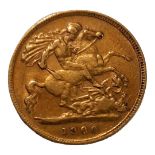 A VICTORIAN HALF SOVEREIGN COIN,dated 1900 with George and Dragon to reverse. Good condition