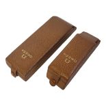 OMEGA, TWO VINTAGE BROWN LEATHER WRISTWATCH BOXES Rectangular form gentâ€™s and ladiesâ€™ boxes.