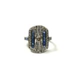 AN ART DECO STYLE RECTANGULAR FORM 18CT WHITE GOLD, SAPPHIRE AND DIAMOND RING Set either side with