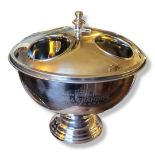 A LARGE SILVER PLATED SPHERICAL WINE COOLER/FOUR BOTTLE HOLDER Engraved 'MoÃ«t Chandon' to base. (