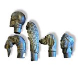 A SET OF FIVE 20TH CENTURY BRONZE NOVELTY WALKING STICK HANDLE/TOPS Formed as a parrot, dog and