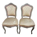 A PAIR OF 19TH CENTURY FRENCH CARVED SALON CHAIRS In original grey painted finish, upholstered seats