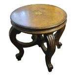 HOWARD AND SONS, A VICTORIAN MAHOGANY STOOL The solid circular top supported on a turned central