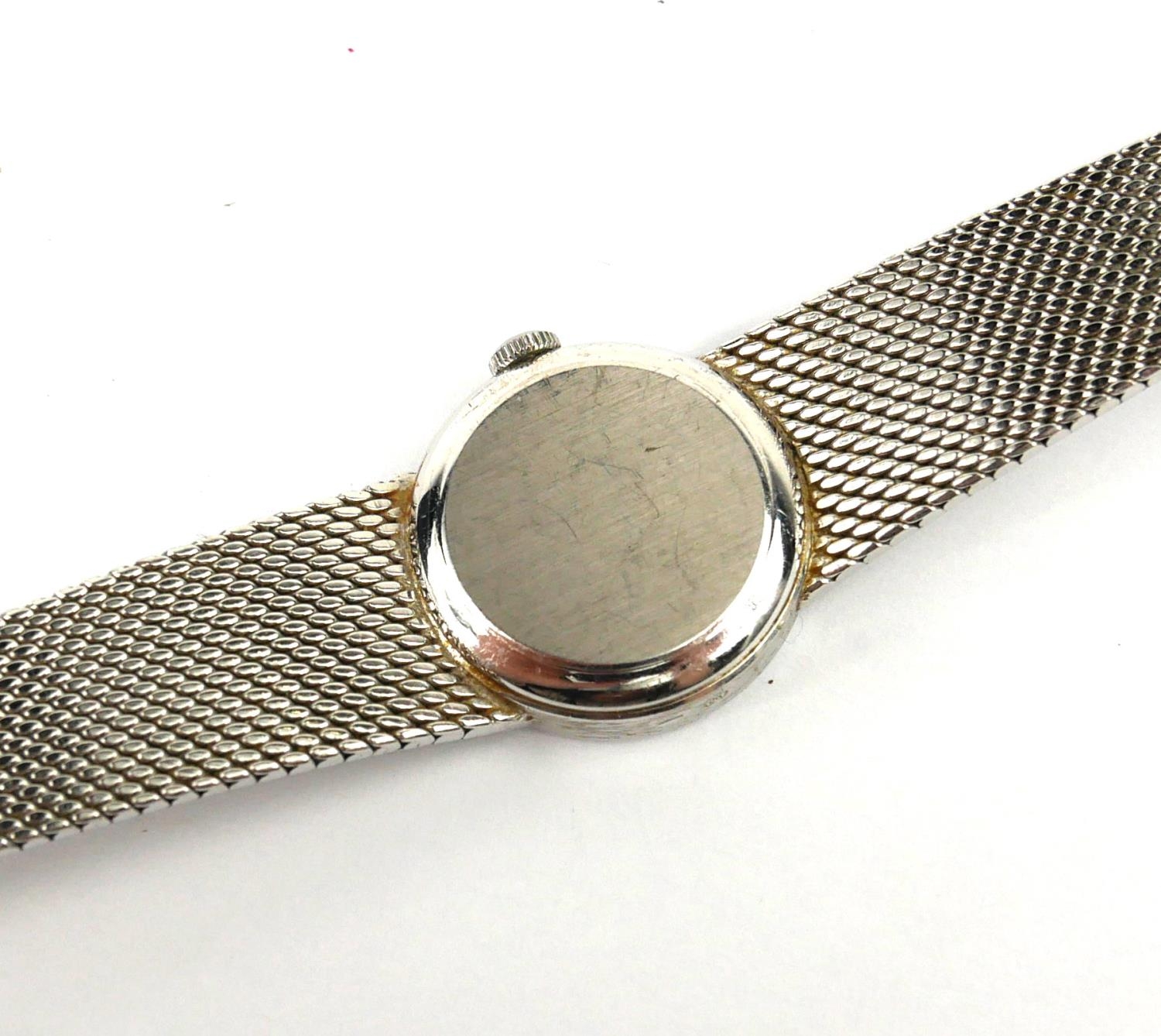 OMEGA, A VINTAGE 9CT WHITE GOLD LADIESâ€™ WRISTWATCH The circular silver tone dial and integral - Image 6 of 6