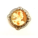 AN EARLY 20TH CENTURY 9CT GOLD CAMEO BROOCH Spherical pierced mount with carved shell cameo of a