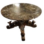 A LATE 19TH CENTURY CARVED BLACK FOREST OAK TABLE With later circular brown marble top, the acanthus
