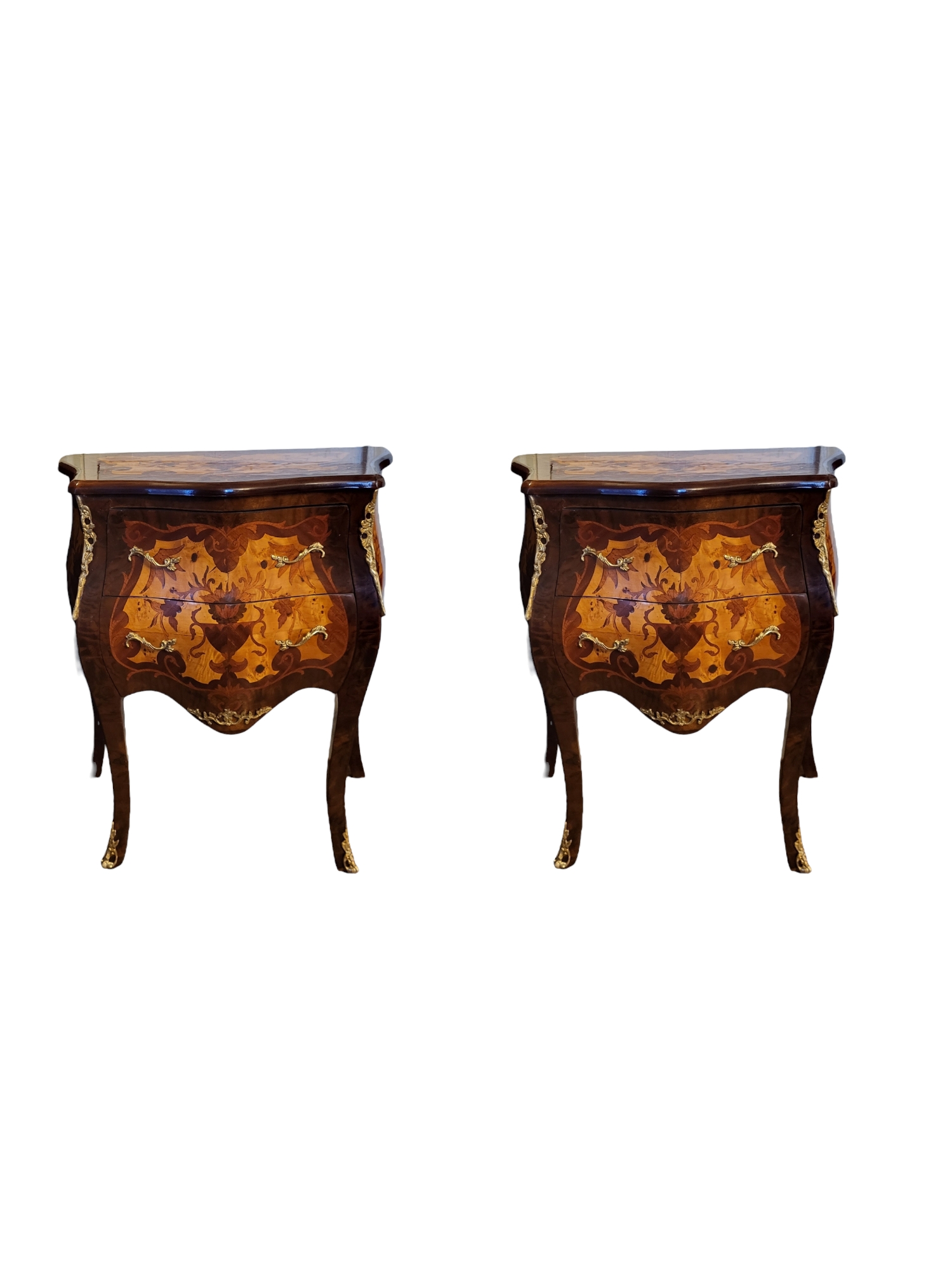 A MATCHED PAIR OF FRENCH MIXED EXOTIC WOOD BOMBE TWO DRAWER CHESTS Applied with gilt metal mounts,