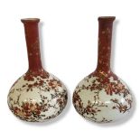 A PAIR OF 19TH CENTURY JAPANESE MEIJI KUTANI POTTERY BOTTLE VASES Decorated with exotic birds and