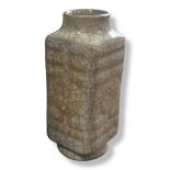 A CHINESE CRACKLE GLAZE PORCELAIN VASE Archaic form, bearing incised gilt inscription and square