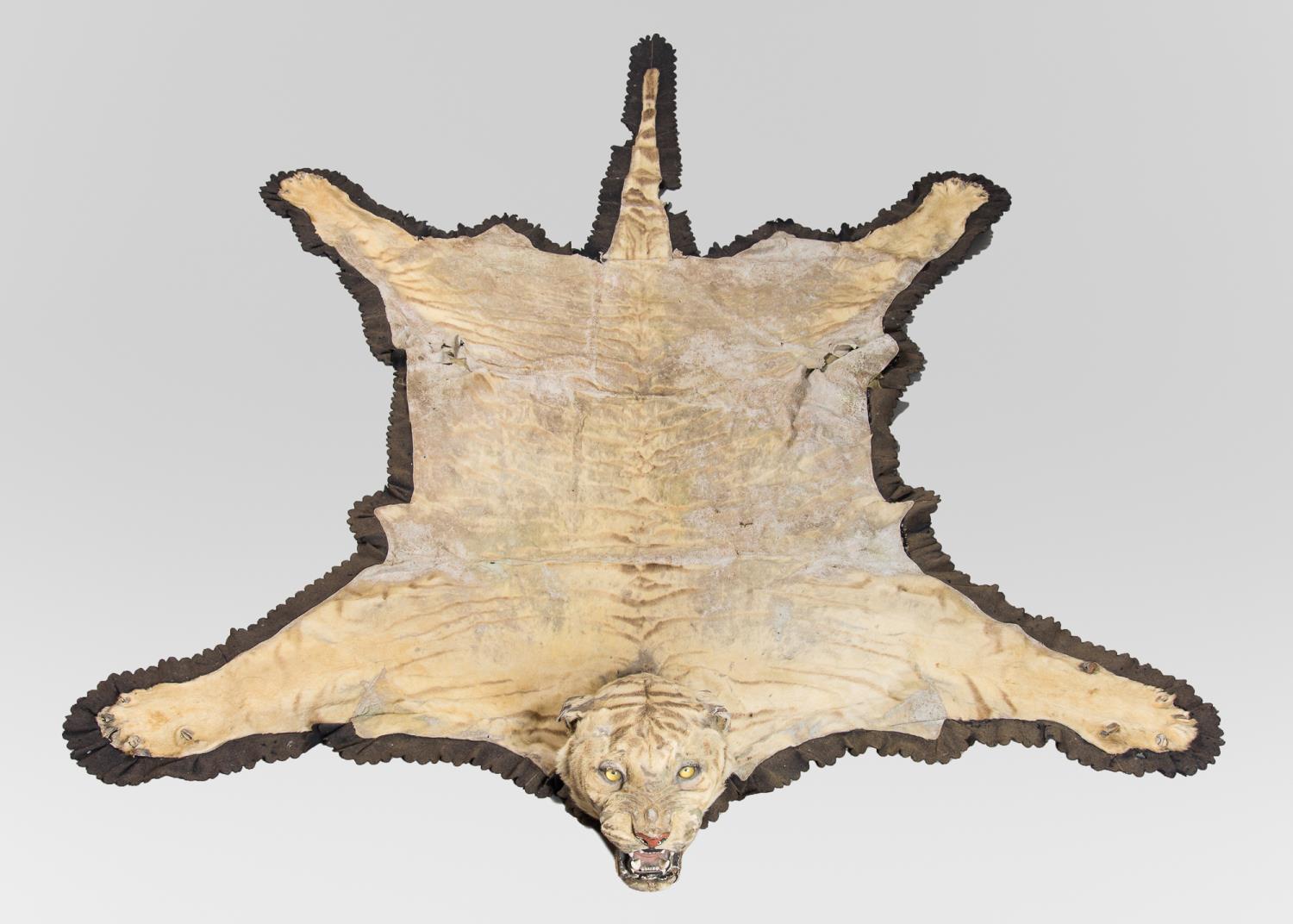 VAN INGEN MYSORE, AN EARLY 20TH CENTURY TAXIDERMY TIGER SKIN RUG. Bearing factory serial no.