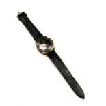 JAEGER LECOULTRE, A VINTAGE 10K GOLD FILLED AUTOMATIC GENTâ€™S WRISTWATCH Having a black tone dial